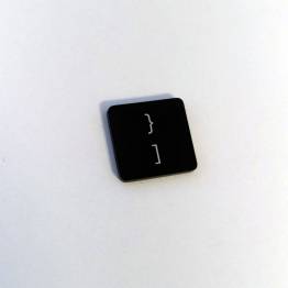  tuborg parentes og firkantet parentes mod venstre knap til Macbook